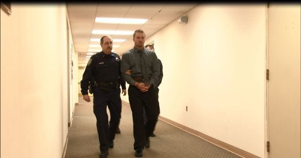 Defendant Beau Chermer, foreground, is led to a courtroom in the Beaver County Courthouse before the start of a hearing Jan. 30, 2014. Chermer and Joseph Arlott are accused of killing Daniel Santia of Hopewell Township.