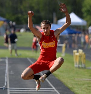 Alongside Anthony Milliner, Alex Burns, pictured, helped continue New Brighton's success in jumping events Friday at the PIAA Track and Field Championships at Shippensburg University.