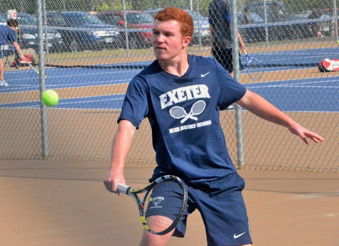 Exeter High School Mark Cochran competes in the No. 3 singles match during Friday's Division I boys tennis match against rival Winnacunnet. The Blue Hawks defeated the Warriors, 6-3. Ryan O'Leary/Seacoastonline