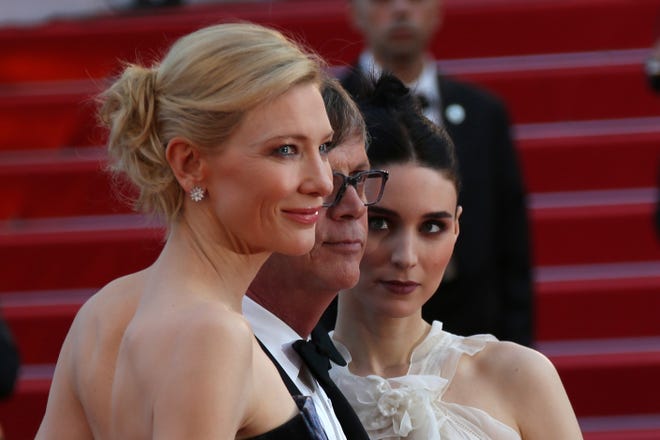 Cate Blanchett, director Todd Haynes and Rooney Mara pose for photographers upon arrival for the screening of their film "Carol" at the Cannes Film Festival. 

Invision