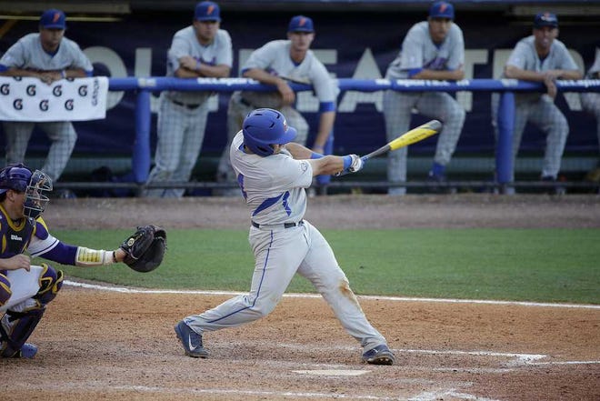 Brynn Anderson Associated Press Florida's Mike Rivera hits a solo home run during the ninth inning against LSU on Saturday in Hoover, Ala.