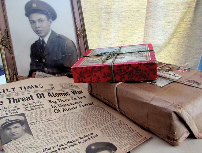 Christmas presents intended for Marlowe “Aus” Kaufman still sit unopened at his nephew’s house in Pekin. Though Kaufman was declared dead after the B-52C bomber he was on crashed into the Himalayas June 3, 1942, his body was never recovered. Next month, his two sisters will send DNA samples to an organization that works to find missing World War II soldiers in hopes of finally burying their brother next to his parents in Pekin.