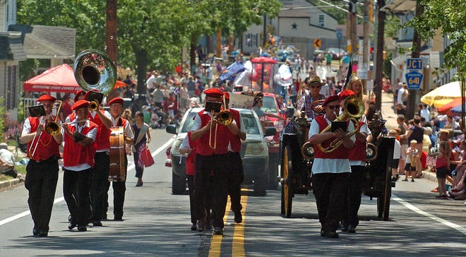 Members of the Liberty Band from Cinnaminson perform along Main Street in Lumberton on Monday.