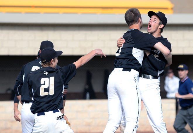 Quaker Valley's John Medich (21), Joey Hess and Chris Tanabe celebrate Wednesday after winning the WPIAL Class AA semifinal game 3-2 in eight innings at North Allegheny High School.