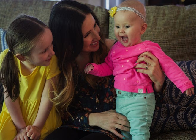"Medi-Share has been a blessing for our family," said Melissa Mira, of Tacoma, Wash., with daughters Jael, left, and Sienna. Mira had hospital bills last year of $200,000.

Seattle Times/Ellen M. Banner