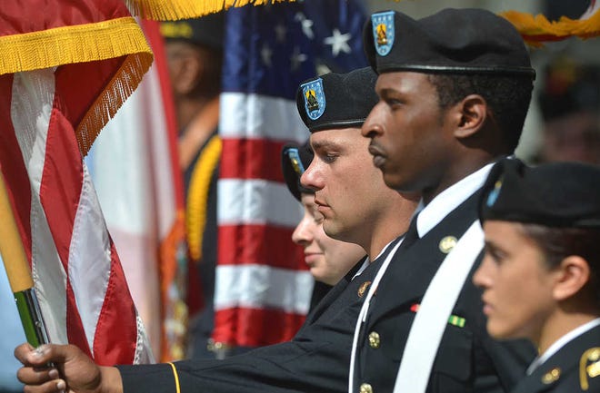 PETER.WILLOTT@STAUGUSTINE.COM A Florida National Guard color guard takes part in the annual Memorial Day observance held in the St. Augustine National Cemetery on Monday, May 25, 2015.