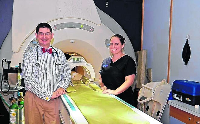 Dr. Chris Levine, right, is the primary neurologist/ neurosurgeon and Dr. 
Kristen Levine is the practice manager at Sarasota's Companion Animal 
Neurology, 7005 S. Tamiami Trail.