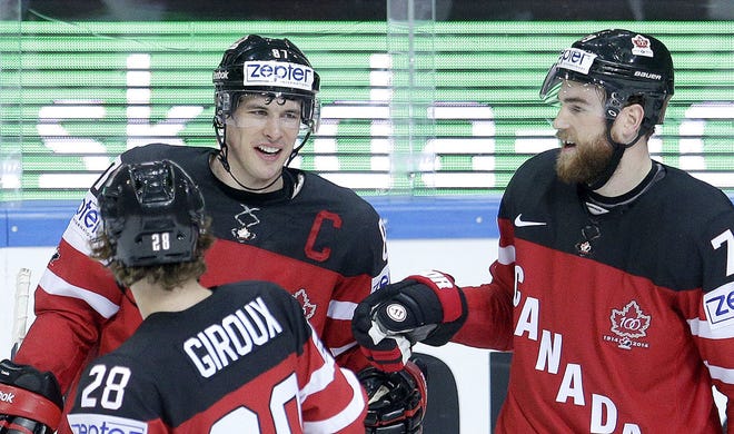 Canada’s Sidney Crosby, center, celebrates with ten mates scoring against the Czech Republic, during the Hockey World Championships Group A match in Prague, Czech Republic on May 4.