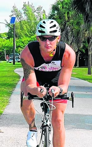 Tyler Price, a 29-year-old Venice resident, is training for his first 
Ironman competition. He will compete in the 2015 Ironman in Lake Placid, 
New York, in July.COURTESY PHOTO