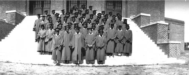In 1931, 55 members of the first graduating class of Williston High School pose on the school's steps. Photo courtesy of New Hanover County Public Library