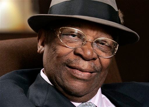 In this Aug. 27, 2008 file photo, blues legend B.B. King poses during an interview in Los Angeles. The body of blues legend B.B. King will be flown on Wednesday, May 20, 2015, to Memphis, Tennessee, the place where a young King won the nickname Beale Street Blues Boy, then will return to the Mississippi Delta where his life and career began. King, whose scorching guitar licks and heartfelt vocals made him the idol of generations of musicians and fans while earning him the nickname King of the Blues, died Thursday, May 14, at home in Las Vegas. He was 89. (AP Photo/Reed Saxon, File)