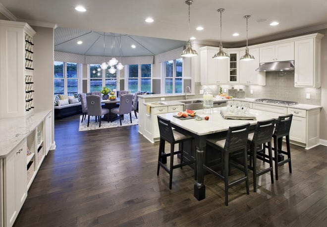 The kitchen area of The Woodlands at Warwick model home.
