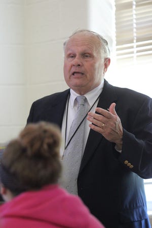 Mike Updike, a docent from the Holocaust Memorial Center in Farmington Hills, speaks Wednesday to students at the Maurice Spear Campus about the Holocaust during World War II.
