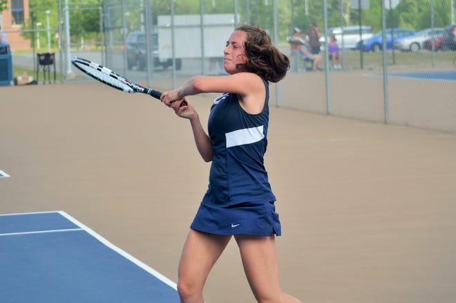 Exeter High School senior Rachel Salzman follows through on a return shot during the No. 3 singles match of Wednesday's Division I girls tennis quarterfinals against Nashua South. Salzman and the Blue Hawks advanced to the semifinals with an 8-1 win. Ryan O'Leary/Seacoastonline