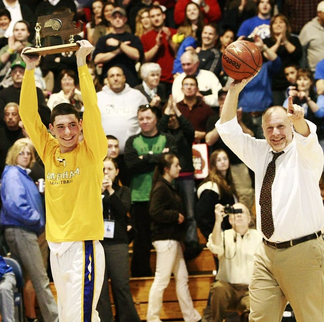 Kevin Brogioli celebrates the 2012 Division III South Sectional title with captain Danny Thomas. MIKE VALERI/STANDARD-TIMES FILE PHOTO