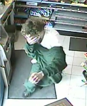 Store surveillance photos of would-be robber at the Royal 7 Food and Deli, New Bedford.



Photos courtesy of the New Bedford Police Department.