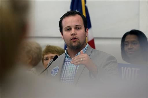 In this Aug. 29, 2014, file photo, Josh Duggar, executive director of FRC Action, speaks in favor the Pain-Capable Unborn Child Protection Act at the Arkansas state Capitol in Little Rock, Ark. Tony Perkins, president of the Washington-based Christian lobbying group, said Thursday, May 21, 2015, that he has accepted the resignation of Duggar in the wake of the reality TV star's apology for unspecified bad behavior as a young teen. (AP Photo/Danny Johnston, File)