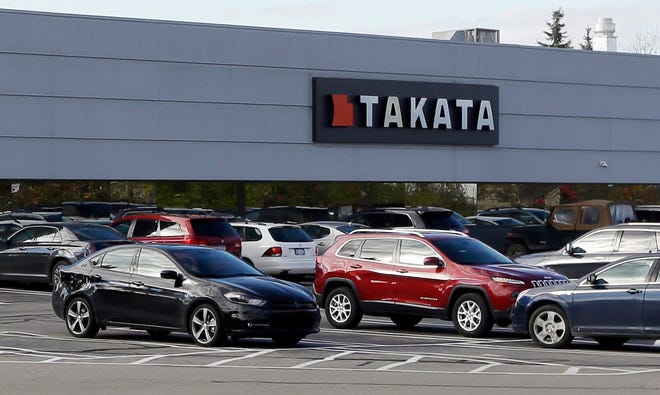 This Oct. 22, 2014, file photo, shows the Takata building, an automotive parts supplier in Auburn Hills, Mich. On Tuesday, May 19, 2015, Takata doubled the size of its air bag recall to 33.8 million air bags, making it the largest recall in U.S. history. The air bags can inflate with too much force, sending metal shrapnel into drivers and passengers. So far the problem has caused six deaths, including five in the U.S.