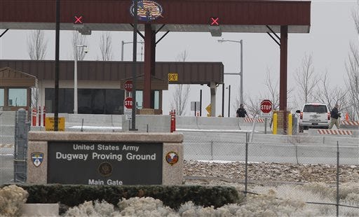 This Jan. 27, 2010, file photo, shows the main gate at Dugway Proving Ground military base, about 85 miles southwest Salt Lake City, Utah. The Centers for Disease Control and Prevention said it is investigating what the Pentagon called an inadvertent shipment of live anthrax spores to government and commercial laboratories in as many as nine states, as well as one overseas, that expected to receive dead spores. A Pentagon spokesman, Col. Steve Warren, said the suspected live anthrax samples were shipped from Dugway Proving Ground, an Army facility, using a commercial delivery service. (AP Photo/Jim Urquhart, File)