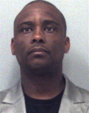 This undated photo provided by the Gwinnett County Sheriff's Department shows Victor Hill. The Atlanta-area sheriff was charged with a misdemeanor Wednesday, May 6, 2015, in the shooting of a real estate agent at a model home. (Gwinnett County Sheriff's Department via AP)