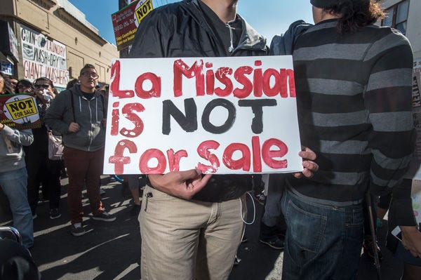 Protesters rally against gentrification in San Francisco's Mission District. A vacation there last summer opened a reality panelist's eyes to the city's huge homeless problem.