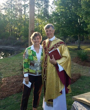 Father Mike Hesse and his bride, Claudia, after the Sunrise Service on Easter 2015. They will soon have a new road to travel down after his retirement.