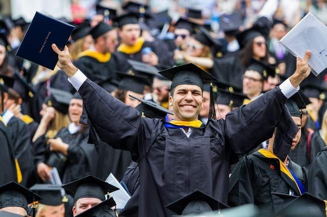Graduates celebrate during the 2015 University of New Hampshire commencement ceremony held on May 16 in Durham.