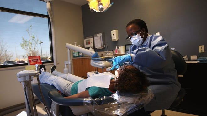 Dental hygienist made the list of top jobs for women, as determined by CareerCast. (Getty Images)