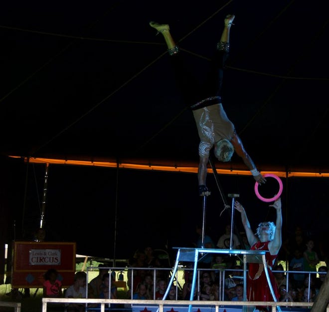 Paul and Natalie Franklin perfrom for the crowd during the Lewis and Clark Circus Thursday evening at Red Run Park.