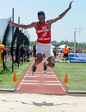 Rancocas Valley's Diante Bah jumps in the long jump event at the South Jersey Group 4 boy's States at Egg Harbor Township High School Saturday May 30, 2015.