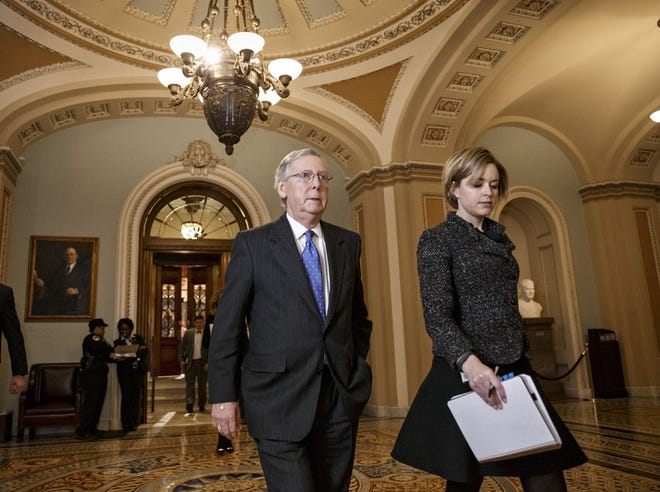 Senate Majority Leader Mitch McConnell, R-Ky., leaves the Senate chamber.