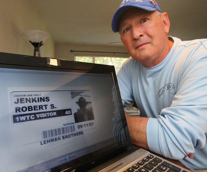 New Smyrna Beach resident Bob Jenkins shows a copy of his 1 World Trade Center visitor pass from Sept. 11, 2001 on the screen of his laptop computer. Jenkins was on the 39th floor of the north tower for a business meeting the morning of the terrorist attack.