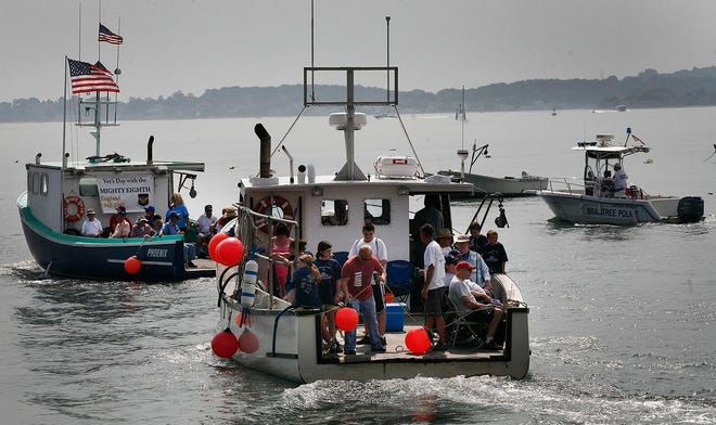 A lobster boat full of veterans leaves the Quincy Yacht Club for a day on the ocean with the Harvey's Salt Water Fishing Club in Hough's Neck.