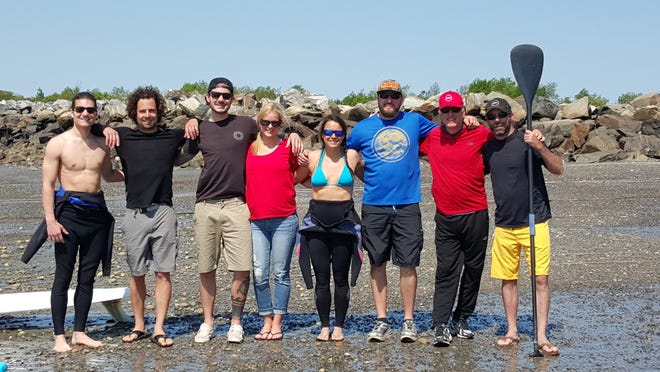 From left, Sean Fonteyne, Marcel Miranda, Carrie Forbes, Christine Bisson, Joe Kelley and Drew Craig. They are among a group of people planning to paddle board to the Isles of Shoals this summer as a fundraiser for the Big Brothers Big Sisters of New Hampshire. Courtesy photo