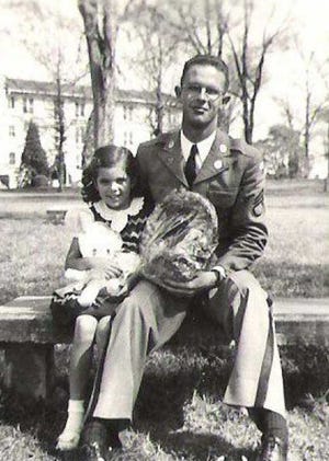 Photos special to the Savannah Morning NewsLEFT: Barbara Brown Wolling poses for an Easter photo with her brother, Billy Brown. RIGHT: Barbara holds Billy's medals and other items. Billy Brown was a CIA agent during the Cold War who worked on the U-2 spy plane, and died in a plane crash in 1995.