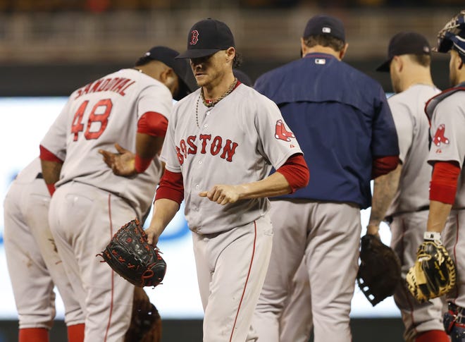 Red Sox pitcher Clay Buchholz is relieved by manager John Farrell during the eighth inning of his last start against the Twins. Buchholz will start Monday night's game at Fenway Park, also against Minnesota. THE ASSOCIATED PRESS