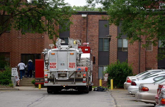 Firefighters responded Tuesday morning to the E.B. McNitt Apartments in New Brighton, scene of a fatal fire.