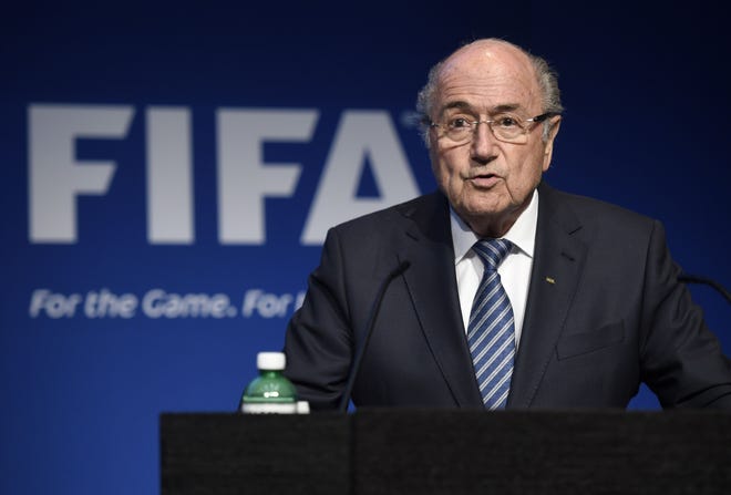 FIFA President Sepp Blatter speaks during a press conference at the FIFA headquarters in Zurich, Switzerland, Tuesday, June 2, 2015. FIFA President Sepp Blatter says he will resign from his position amid corruption scandal.