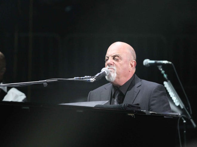 Billy Joel performs at Philips Arena on Saturday, Feb. 28, 2015, in Atlanta.