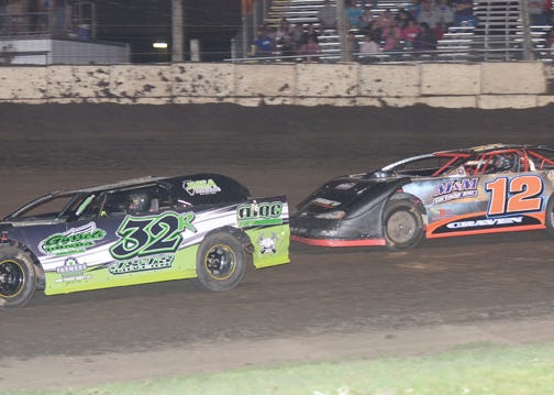 Richie Rich, left, and Richard Craven battle in the Sportsman class at FALS recently.