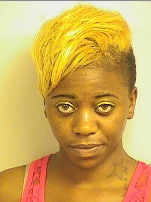 Aundrea Chantel Willson is accused of breaking a bottle and using it to cut the victim.