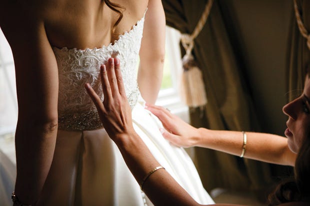 On Aug. 23, 2014, Christina and Brandon Fellows wed at the Greek Orthodox Church in Downtown Columbus. Christina wore a Rosa Clara gown from White of Dublin, which she had preserved by Edina Cleaners.