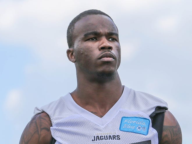 Safety James Sample (36) enters the practice field for day two of Jacksonville Jaguars NFL football rookie camp Saturday, May 9, 2015, in Jacksonville, Fla. (AP Photo/Gary McCullough)