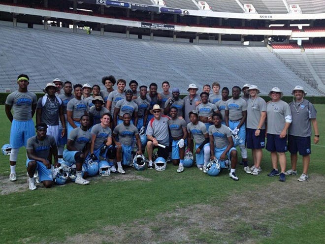 Members of the Dorman football team pose after winning the University of Georgia 7-on-7 tournament for the second straight year on Friday in Athens. Ga.