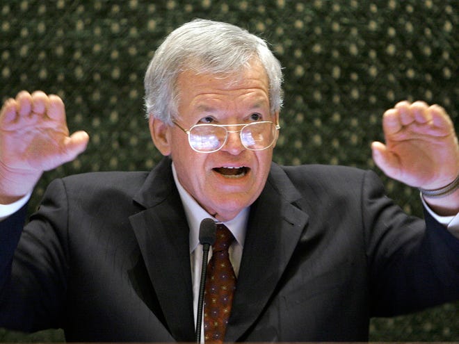 In this March 5, 2008, file photo, former U.S. House Speaker Dennis Hastert speaks to lawmakers on the Illinois House of Representatives floor at the state Capitol in Springfield, Ill.