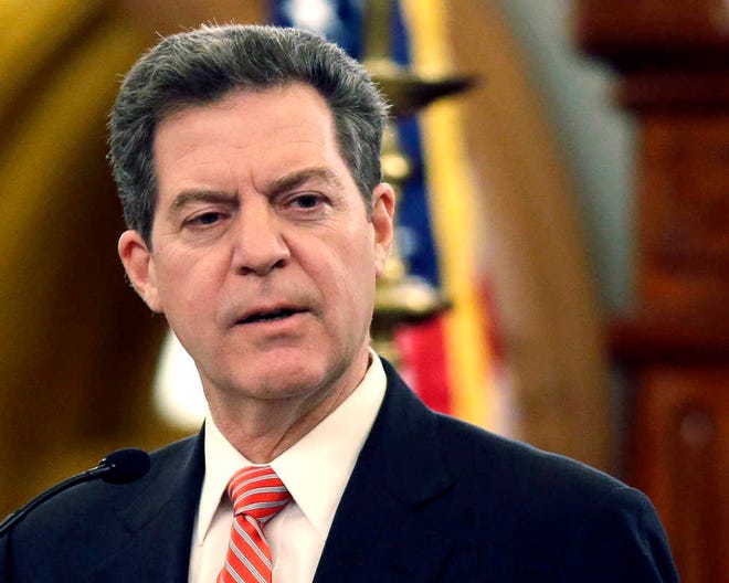 A House committee that had rejected Gov. Sam Brownback's plan to take millions from the Kansas Department of Transportation stood down Monday.