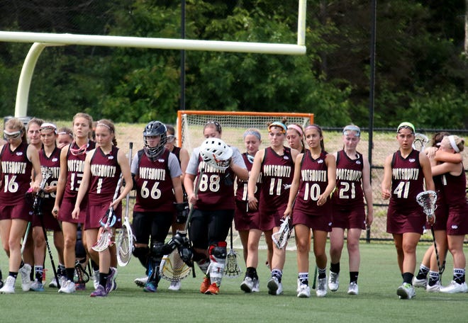 The Portsmouth High School girls lacrosse team reacts after falling to Hanover, 20-15, in the Division II semifinals at Exeter on Saturday.

Ioanna Raptis/Seacoastonline
