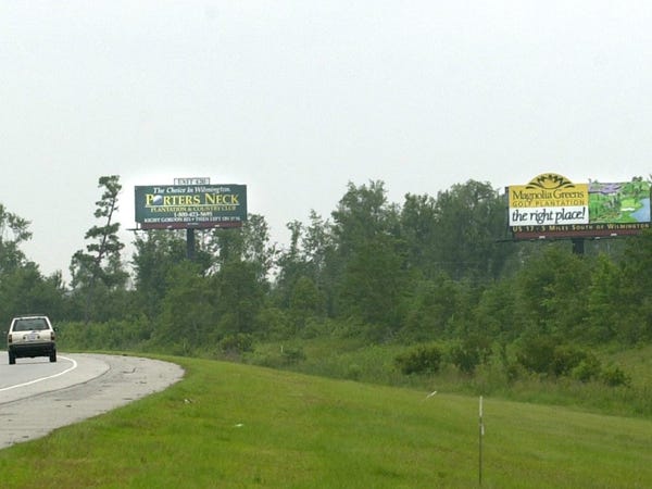 Three billboards face southbound traffic on I-40 in Pender County. A proposed bill that would give billboard owners more freedom has raised the concern of Wilmington officials. StarNews file photo