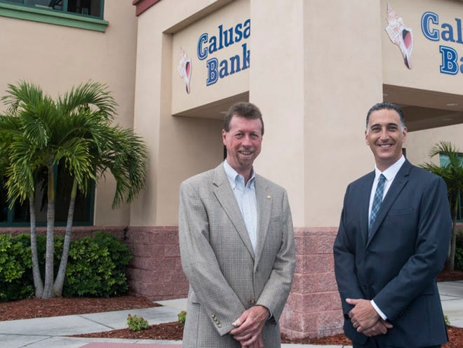 Chief Executive Officer Lew Albert and President Todd Katz of Calusa Bank, which is being bought by Dunedin-based Achieva Credit Union.