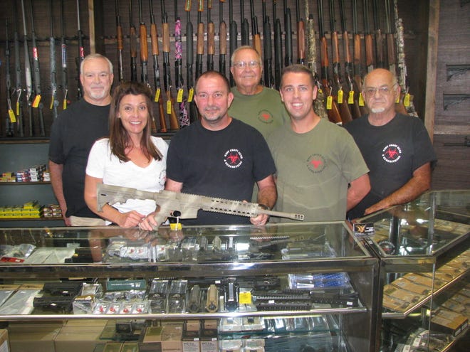 West Coast Guns and Gunsmithing, located around close to Knight's Trail Park at 3469 Precision Drive in Nokomis, offers a full selection of tactical and sporting arms, in addition to custom guns and gunsmithing. Pictured left-to-right are: John Christian, owners Diana and Paul Westmoreland, Gary Mevius, Jon Mann and Leonard Santososso.